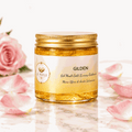 Maschera Viso Gel Dorata in barattolo trasparente con gel dorato scintillante, etichetta crema e tappo metallico oro.